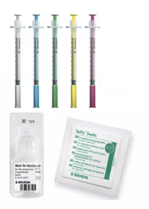 Five syringes with different coloured plungers on a white background