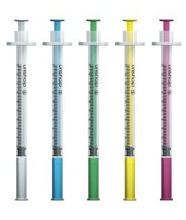 Five syringes with coloured plungers on a white background