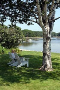 Person resting in shade outdoors