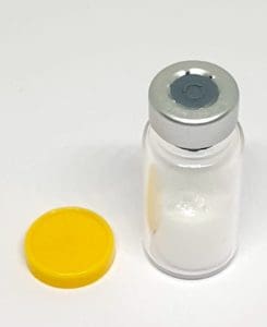 Melanotan 2 vial with yellow cap removed – peptide tanning injection prep